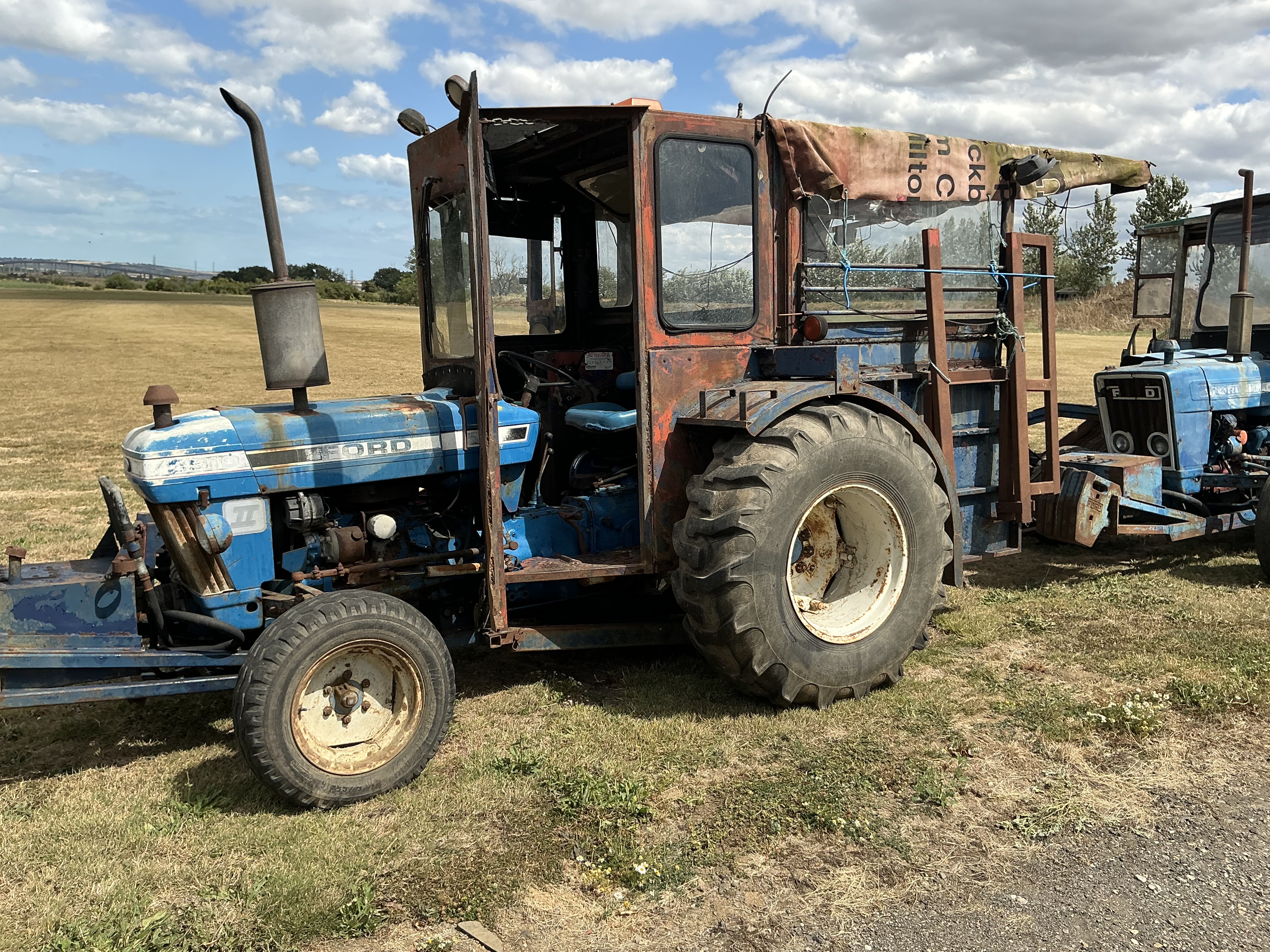 Brouwer a3a turf harvester on ford 3910 + Wooten harvester on ford 3000 for sale